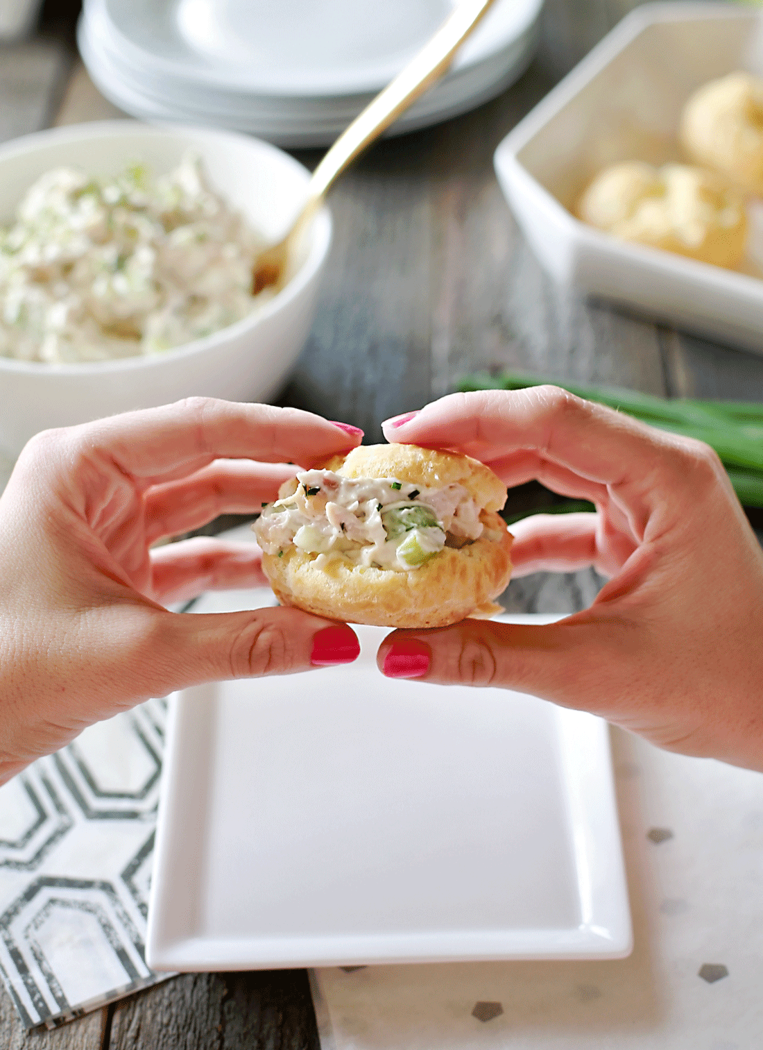Chicken Salad on light and fluffy cream puffs. Fun, delicious, easy recipe by Flirting with Flavor.
