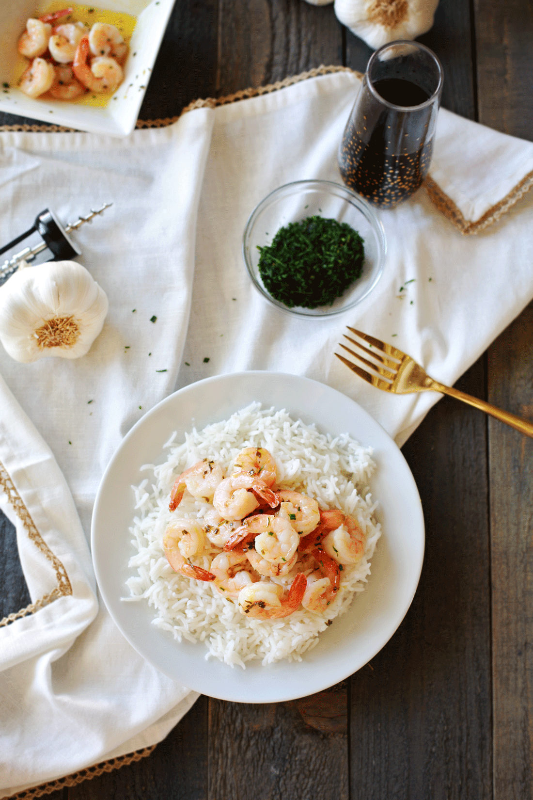 Shrimp cooked in a Garlic Butter and drizzled with a sauvignon blanc glaze. Sweet Heat Garlic Shrimp by Flirting with Flavor.