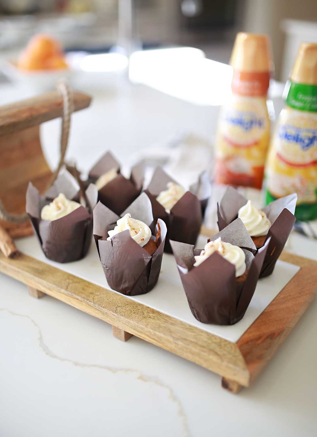 Best ever Pumpkin Spice cupcakes with frosted sugar cookie cream cheese frosting!
