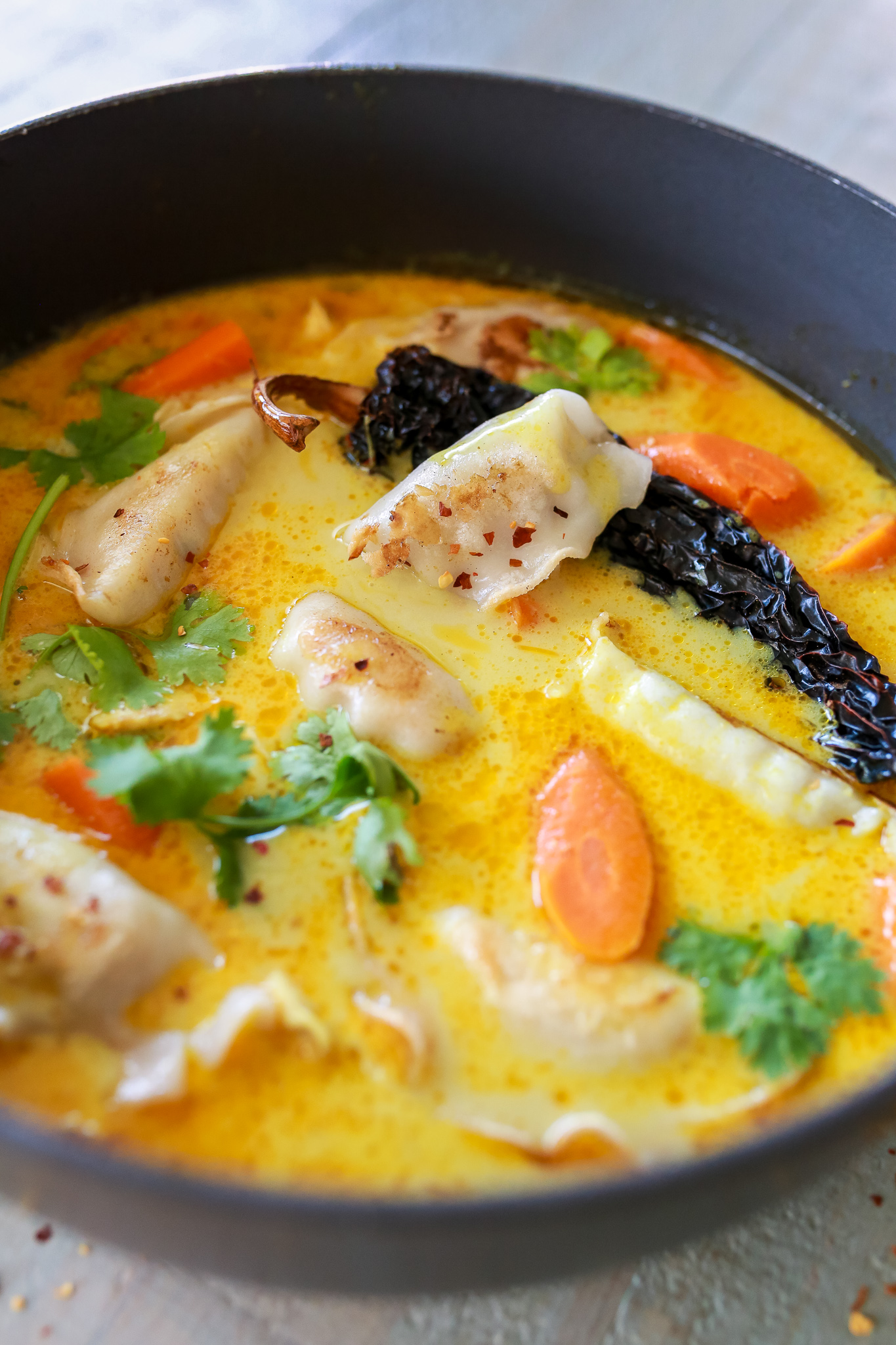 Best ever Coconut curry soup with chicken potstickers!
