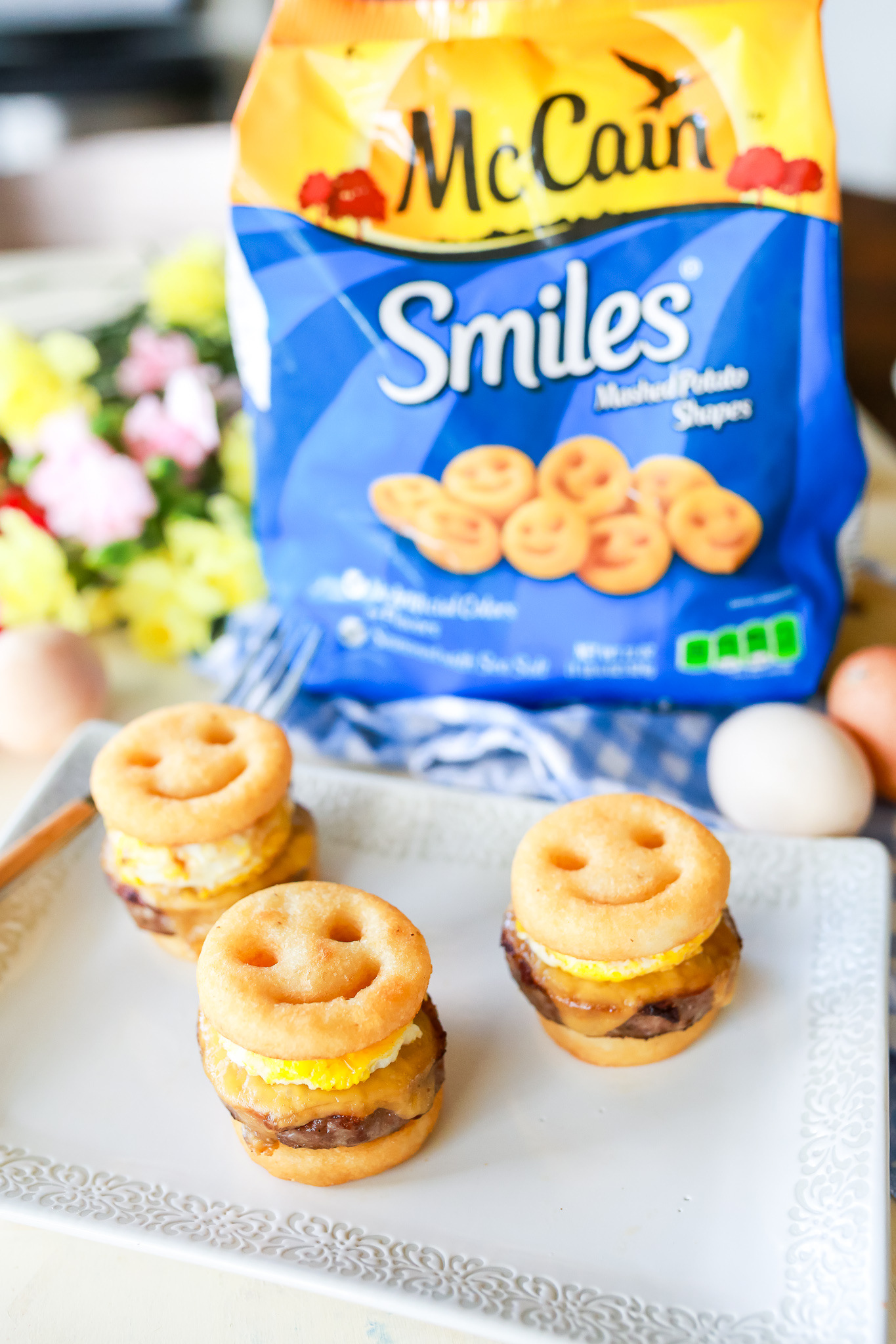 Quick, easy, & FUN family breakfast sliders! Sausage, egg, & cheese sandwiches reinvented into a simple but delicious sandwich the whole family can enjoy!